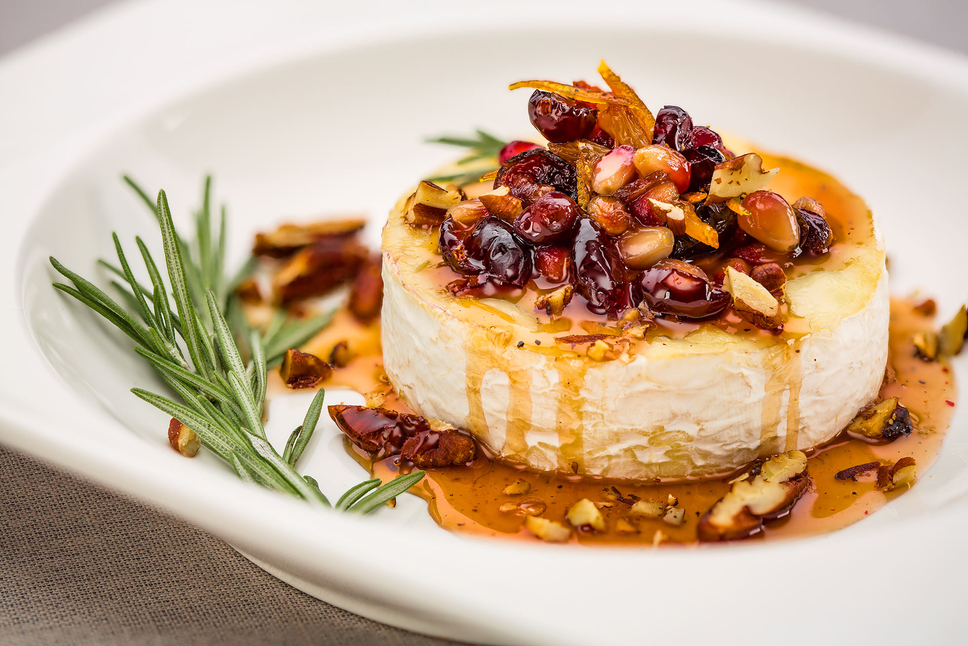Baked Petit Brie with cranberries and pomegranate