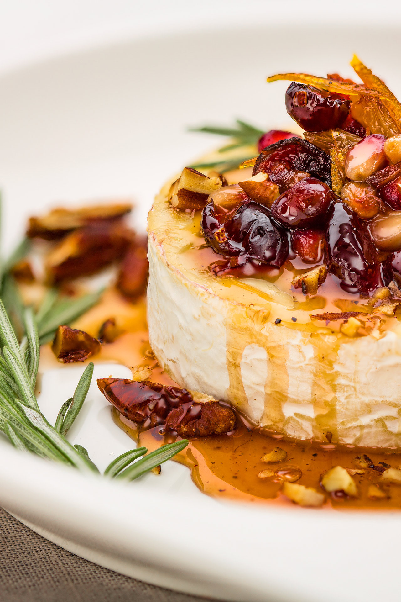 Baked Petit Brie with cranberries and pomegranate