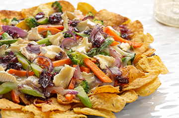 French style nachos with Brie au Bleu and cranberries