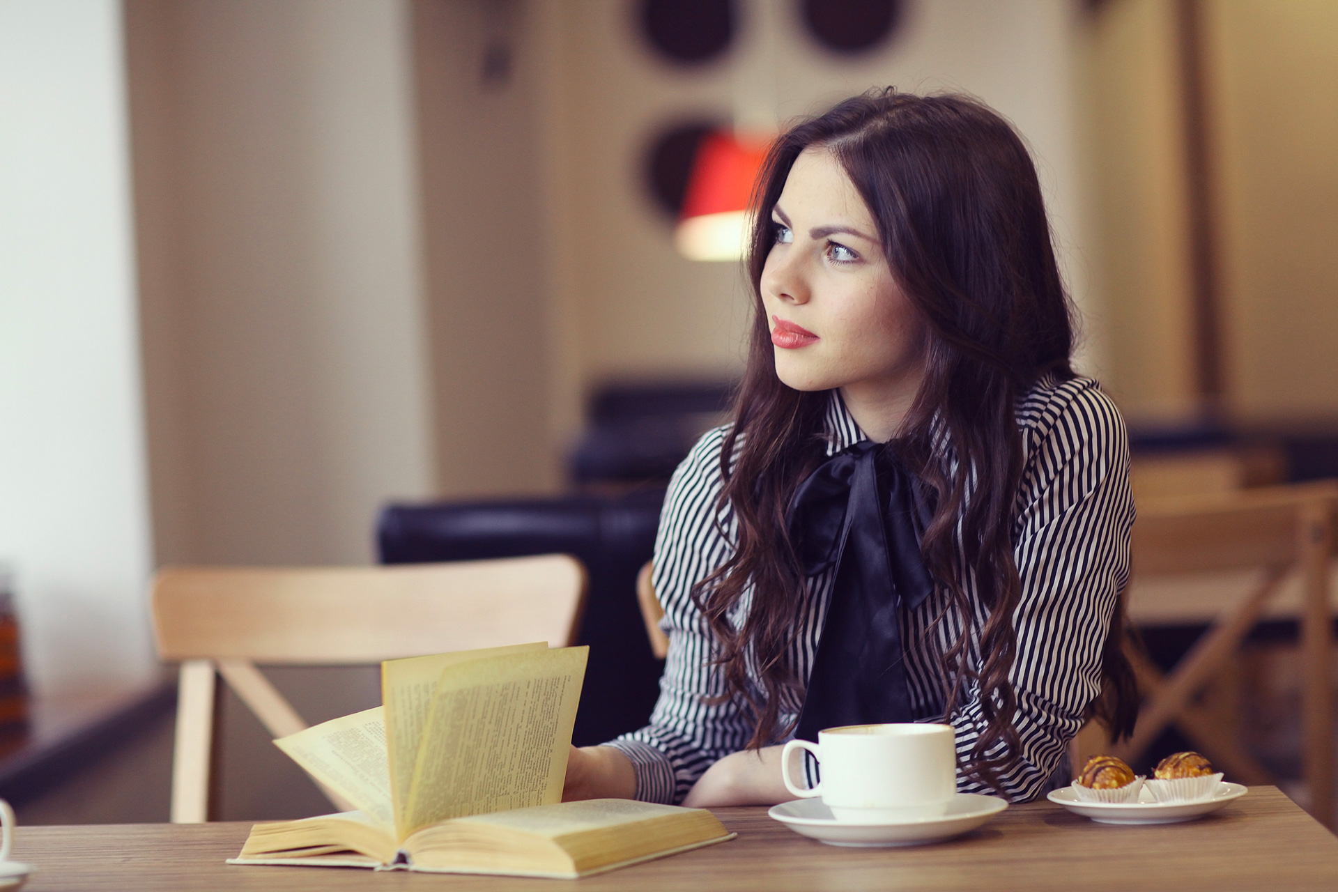 Woman in a coffee shop Woman in a coffee shop